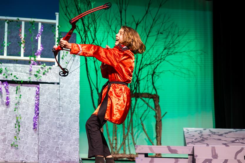 Students perform onstage